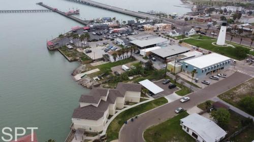 an aerial view of a town next to the water at Bungalow Tarvana-#1 in Port Isabel