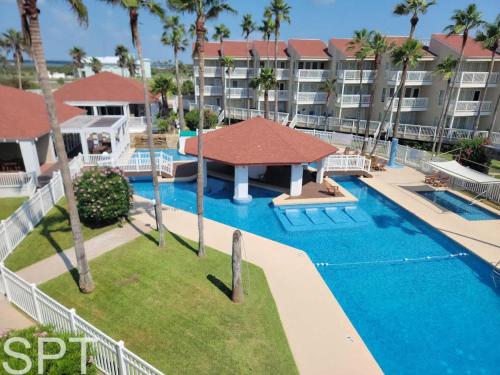 an image of a swimming pool at a resort at Gulfpoint 1302 in South Padre Island