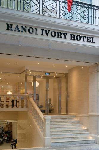 a harriott inventory hotel with stairs in a mall at Hanoi Ivory Hotel in Hanoi
