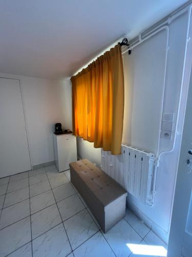 Zona de estar de Studios privatifs avec vue sur Jardin