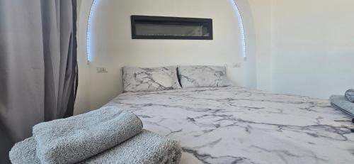 Ένα ή περισσότερα κρεβάτια σε δωμάτιο στο SeaView Rooms