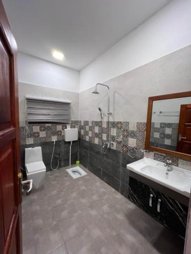 Et badeværelse på Waghill B Cottage