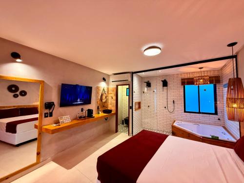 Postel nebo postele na pokoji v ubytování Casinhas do Morro