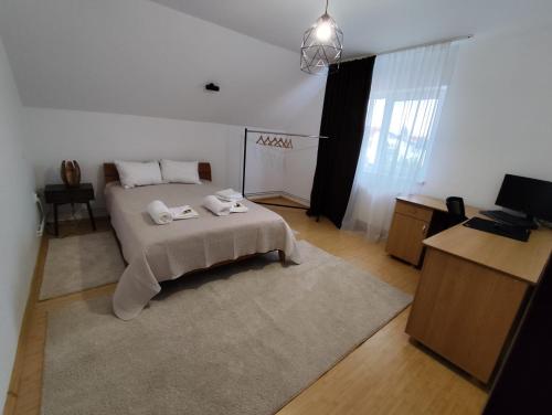 Ένα ή περισσότερα κρεβάτια σε δωμάτιο στο Emi's House