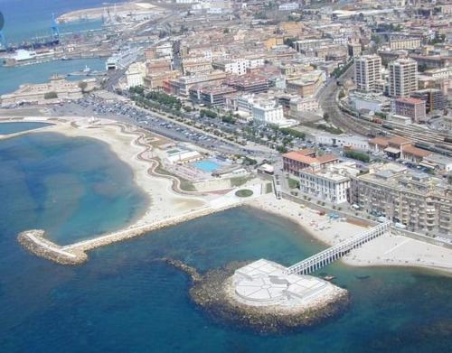 an aerial view of a beach and the ocean at Suite beachfront near the station and Port, 5 beds in Civitavecchia