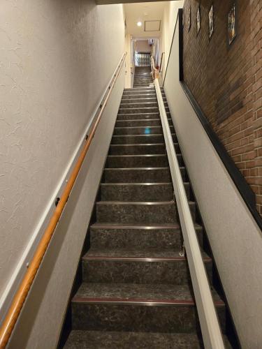 a stairway leading up to a building at Kawasaki Central House in Kawasaki