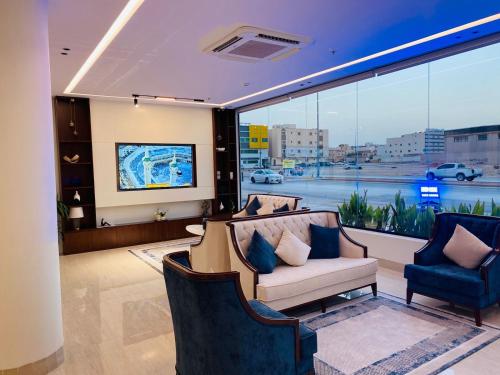 Posezení v ubytování ليناتيل للشقق المخدومه