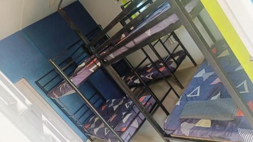 an overhead view of a room with bunk beds at Chill Beach Abode Hostel in Arambol