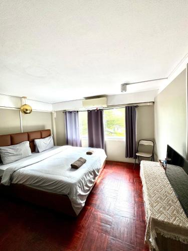Ένα ή περισσότερα κρεβάτια σε δωμάτιο στο You Empire Hostel & Bar
