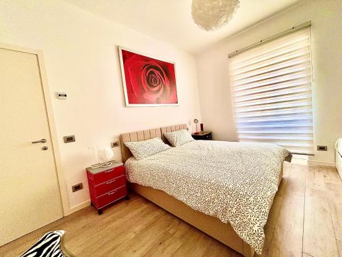Ένα ή περισσότερα κρεβάτια σε δωμάτιο στο La Reggia b&b