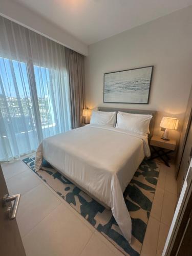 Ένα ή περισσότερα κρεβάτια σε δωμάτιο στο Vida hotel suite 2 apartment two bedrooms