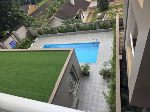 Πισίνα στο ή κοντά στο Primrose Apartments Kololo