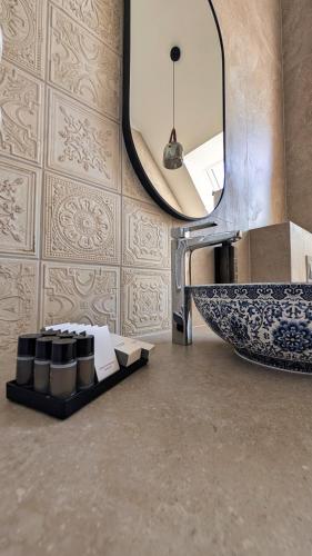 a bathroom with a sink and a mirror at 3 Sówki in Krajno Zagórze Drugie