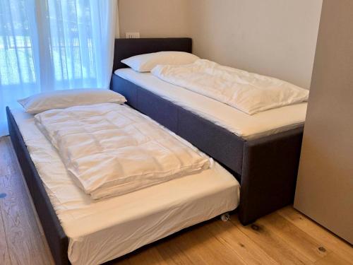 Ένα ή περισσότερα κρεβάτια σε δωμάτιο στο Sole Suites at Lago Dorato, Luxury, Lake View