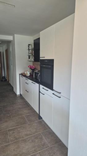 Kuchyň nebo kuchyňský kout v ubytování Panorama Apartment bei Familie Schoahs