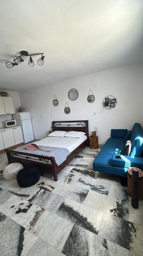Ένα ή περισσότερα κρεβάτια σε δωμάτιο στο Bellissimo apartment Naxos