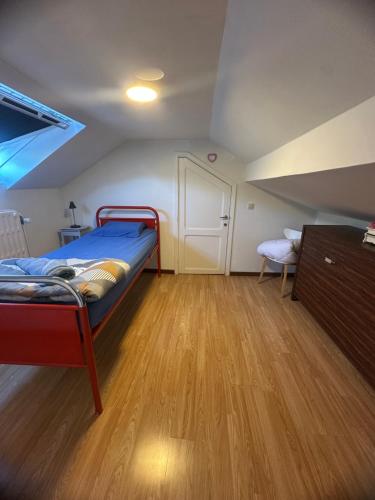 Una cama o camas en una habitación de Le Paradis Mosan