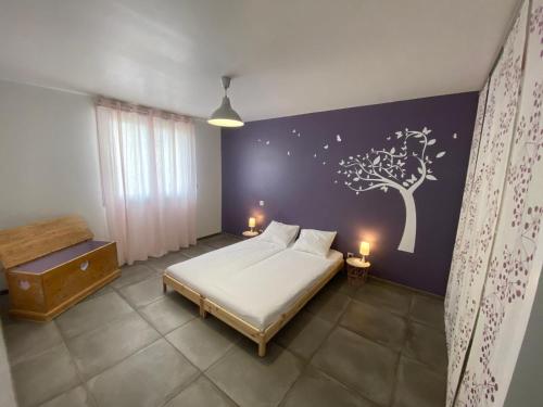 Ένα ή περισσότερα κρεβάτια σε δωμάτιο στο Maison de style 8 à 10 personnes