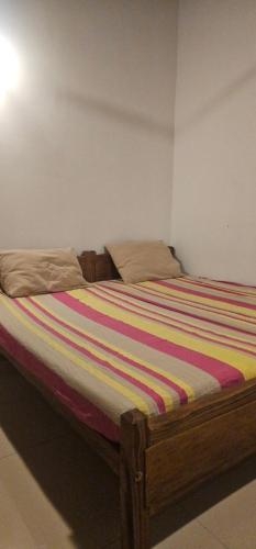 Postel nebo postele na pokoji v ubytování VThree Hotel