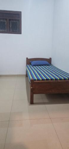 Postel nebo postele na pokoji v ubytování VThree Hotel