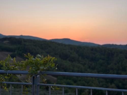 a sunset view from the top of a mountain at Castello di Francocci Spoleto in Marzolini