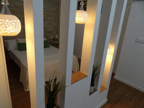 Katil atau katil-katil dalam bilik di Casas jerezanas Loft Olivier