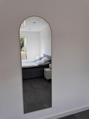 Design Apartment Zweibrückenにあるベッド