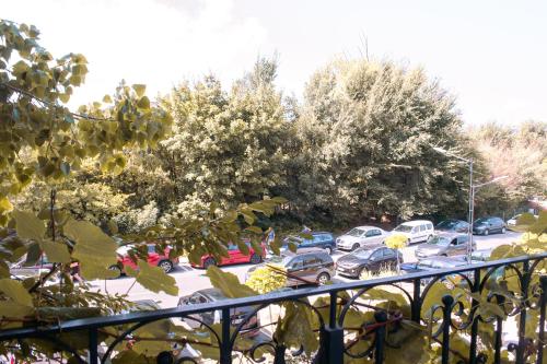 a view of a parking lot with cars parked at ElStefanino House in Eforie Nord