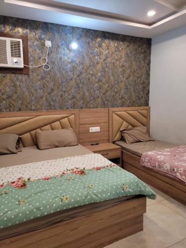 Una cama o camas en una habitación de Hotel Pinaka