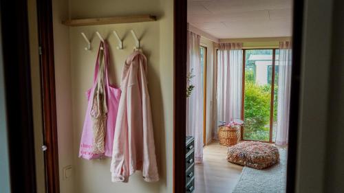 Postel nebo postele na pokoji v ubytování Boutique Budget tinyhouse Veluwe