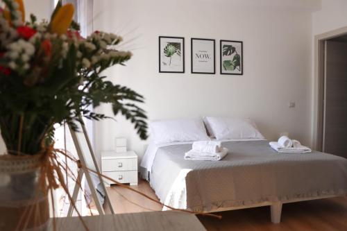 Postel nebo postele na pokoji v ubytování B&B Carlo V