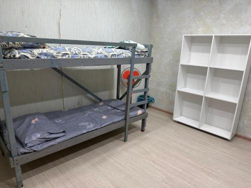 Postel nebo postele na pokoji v ubytování Sun City Hostel
