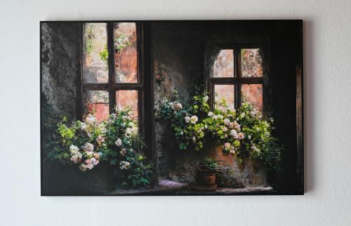 a painting of two windows with flowers in them at Mahesars Home 2 in Ennepetal