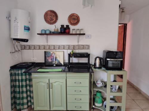 Η κουζίνα ή μικρή κουζίνα στο Casa lupe