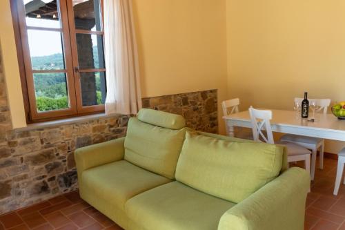 Posezení v ubytování Appartamento in Villa con Jacuzzi