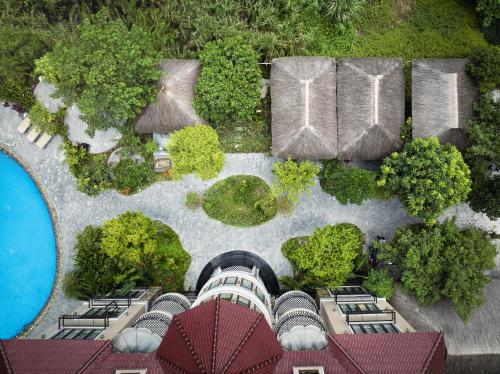 an aerial view of a resort with a swimming pool at Indochine Boutique Hotel Ninh Bình in Ninh Binh
