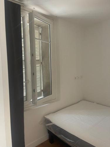 Llit o llits en una habitació de Marseille