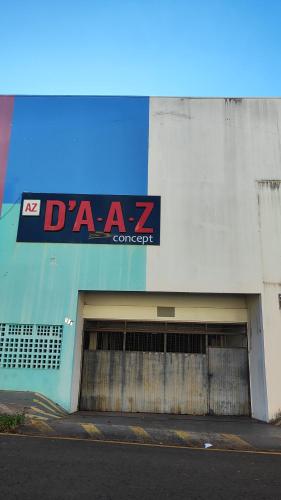 a building with a dza z concert sign on it at Nova Jerusalém in Cianorte