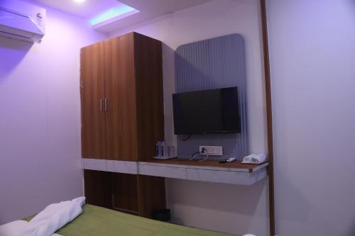 Un ou plusieurs lits dans un hébergement de l'établissement Hotel Metro City
