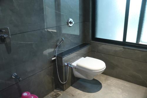 Salle de bains dans l'établissement Hotel Metro City