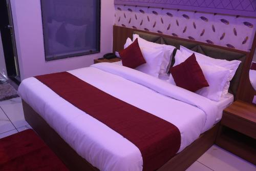 Un ou plusieurs lits dans un hébergement de l'établissement Hotel Metro City