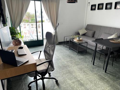 Khu vực ghế ngồi tại Mamarosa Fuerteventura Base Perfecta 5min Aeropuerto & Teletrabajo