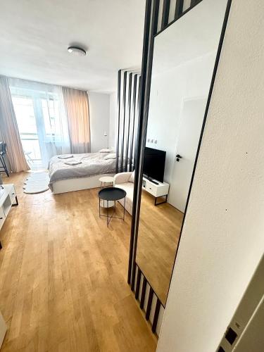 Televisyen dan/atau pusat hiburan di Apartment Riviéra 2 parking and smart check in
