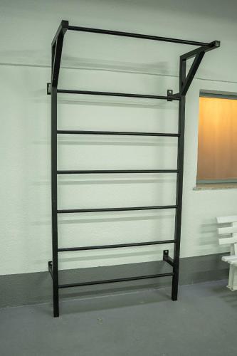 a metal rack against a wall in a room at ibis Copacabana Posto 5 in Rio de Janeiro