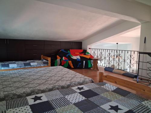 Ένα ή περισσότερα κρεβάτια σε δωμάτιο στο La Rosa