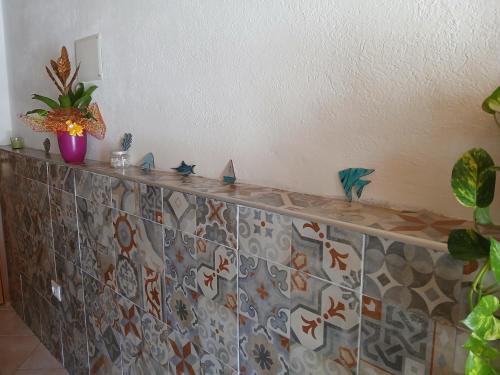 a counter top with star decorations on top of it at Da Nonnu in Teulada