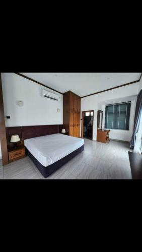 Ένα ή περισσότερα κρεβάτια σε δωμάτιο στο XQ Villa