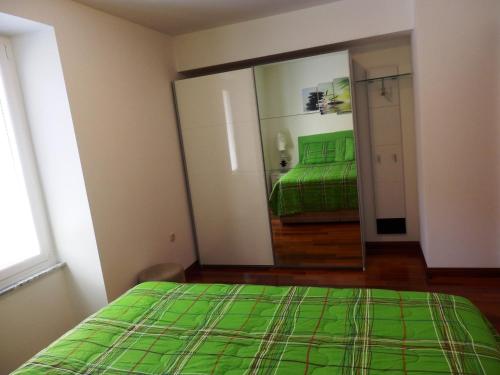Ένα ή περισσότερα κρεβάτια σε δωμάτιο στο Apartment Pula Center