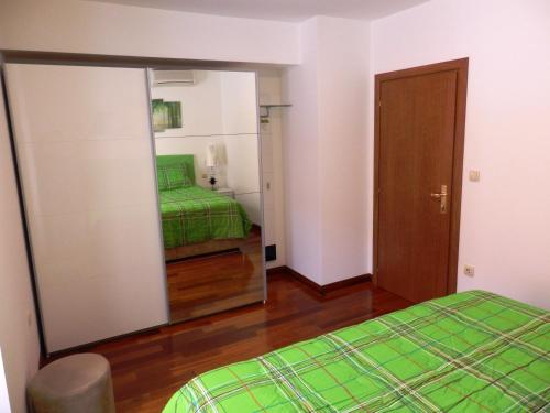 Ένα ή περισσότερα κρεβάτια σε δωμάτιο στο Apartment Pula Center