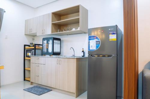 Kuchyň nebo kuchyňský kout v ubytování Ecoluxe Apartelle Davao